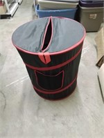 Is portable black and red laundry hamper