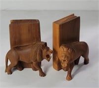 Pair of carved wood lion bookends, 5"w x 3"d x 7"h