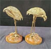 Pair of brass cranes on wood bases 12"h x 7"l