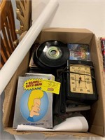 BOX OF CDS, DVDS, ANTIQUE CLOCK, VHS TAPES, 45