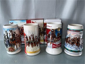 4 Budweiser steins. 1993 Special Delivery