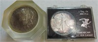 1921 Morgan paperweight and 1991 silver Eagle