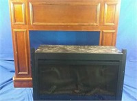 Wooden fireplace with working electric insert