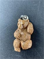 Dark mammoth ivory bear pendant on sterling silver