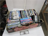 Box of DVD and VHS tapes
