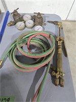 Acetylene torch head gauges and hose