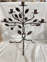 Pair of candle stands with oak leaf decoration