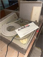 Standard record player in hard case means repair