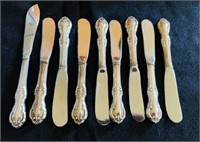 9 sterling silver handled butter knives, part of