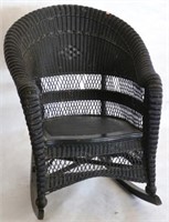 ANTIQUE ROLLED WICKER ARM CHAIR, BLACK