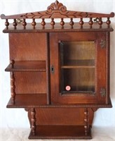 EXCEPTIONAL WALL HANGING CURIO CABINET,