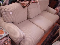 Three cushion sofa and matching armchair by