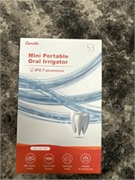 Mini portable oral irrigator