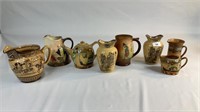 8 ASSORTED ROYAL DOULTON JUGS AND TEAPOT