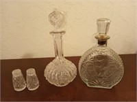 Cut glass decanters and salt and pepper shakers