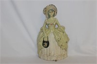 An Antique Cast Iron Lady