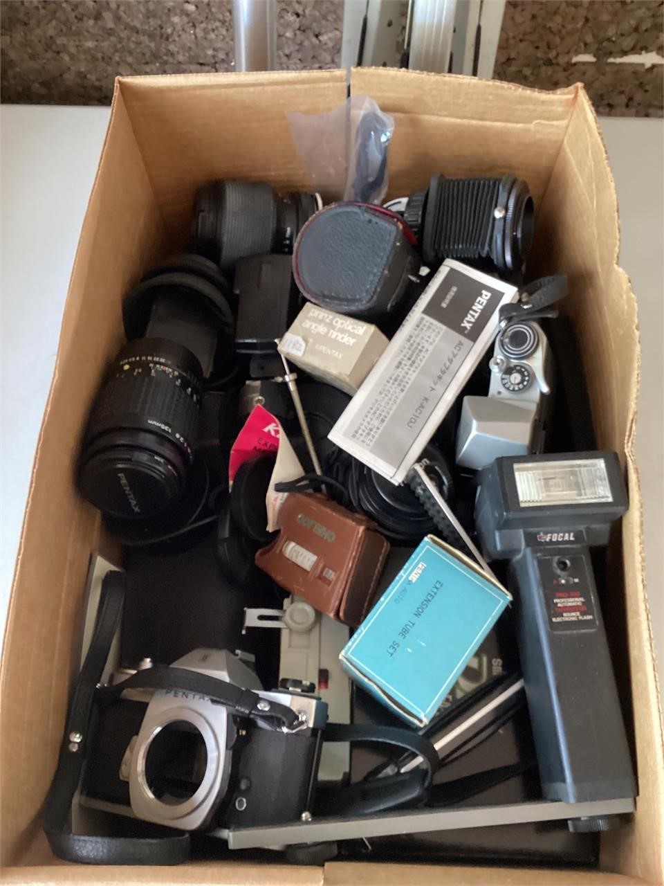 Assorted vintage camera and lenses