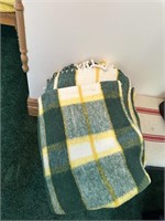 green and yellow throw blanket
