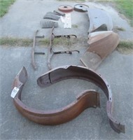 Assortment of 1920-1930 fenders, wheels, and