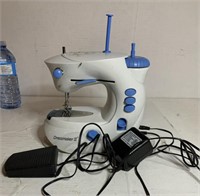 Mini sewing machine  runs
