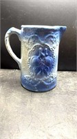 Early Cherry Pattern Stoneware pitcher in the