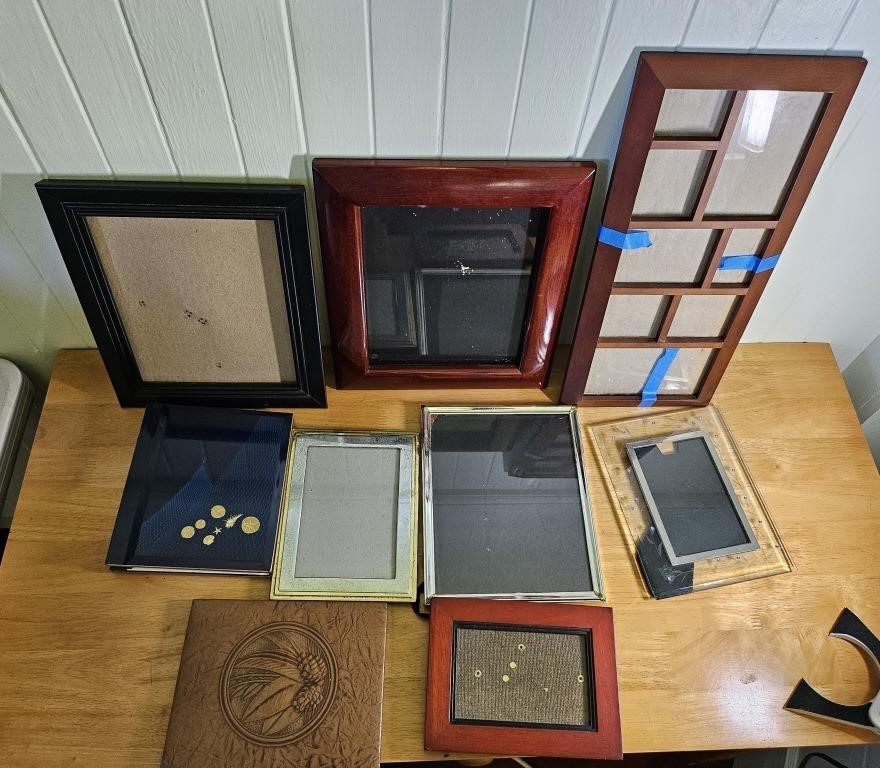 8 picture frames and albums