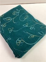 TEAL FABRIC WITH EMBROIDERED FLOWERS