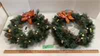 2 lighted Christmas wreaths