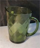 Green pitcher approx 9 inches tall