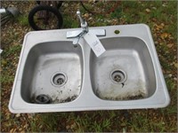 126) Kitchen sink w/Delta faucet