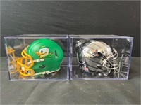 Two U of O Mini Helmets