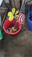 Plastic bucket with yard decor