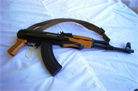 Poly Tech. AK-47S with collapsible stock, magazine