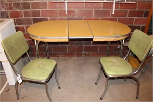 Antique Round Yellow Table with two green chairs