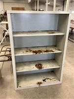 55 x 37 1/2 x 15 metal bookcase, has some rust.