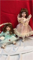 2 porcelain dolls/ green satin/ pink