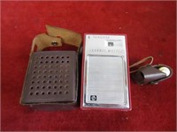 Vintage red transistor pocket radio w/ear plug.