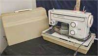 ken more sewing machine with case