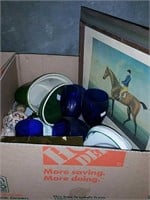 Box of blue glasses and horse picture
