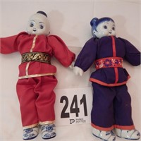 BOY AND GIRL ASIAN DOLLS WITH PORCELAIN HEAD,