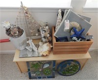 Sea shell themed lot: figural sailboat with
