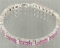 Sterling silver bracelet set with rubies - 7" long