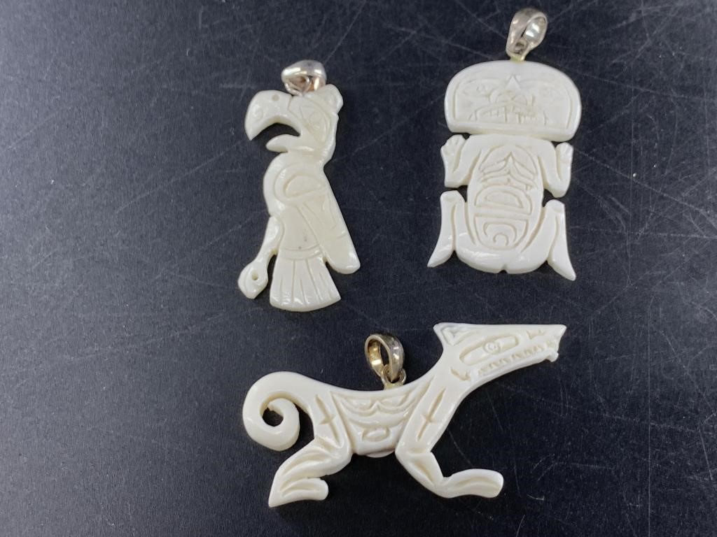 3 Bone carved Tlingit style pendants with bales