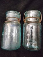 Lot of 2 Lightning Glass jars with glass lids