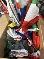 Large box of Misc Flags and Shirts