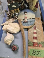 Lighthouse and seashell items as shown