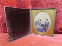 Antique hand colored photograph w/velvet case.