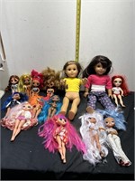 Lot of 2 American dolls and 12 smaller other