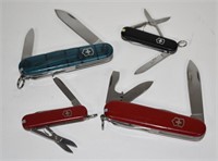 Four Victorinox Swiss Army Pocket Knives