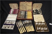 Quantity of cased silver plate cutlery sets
